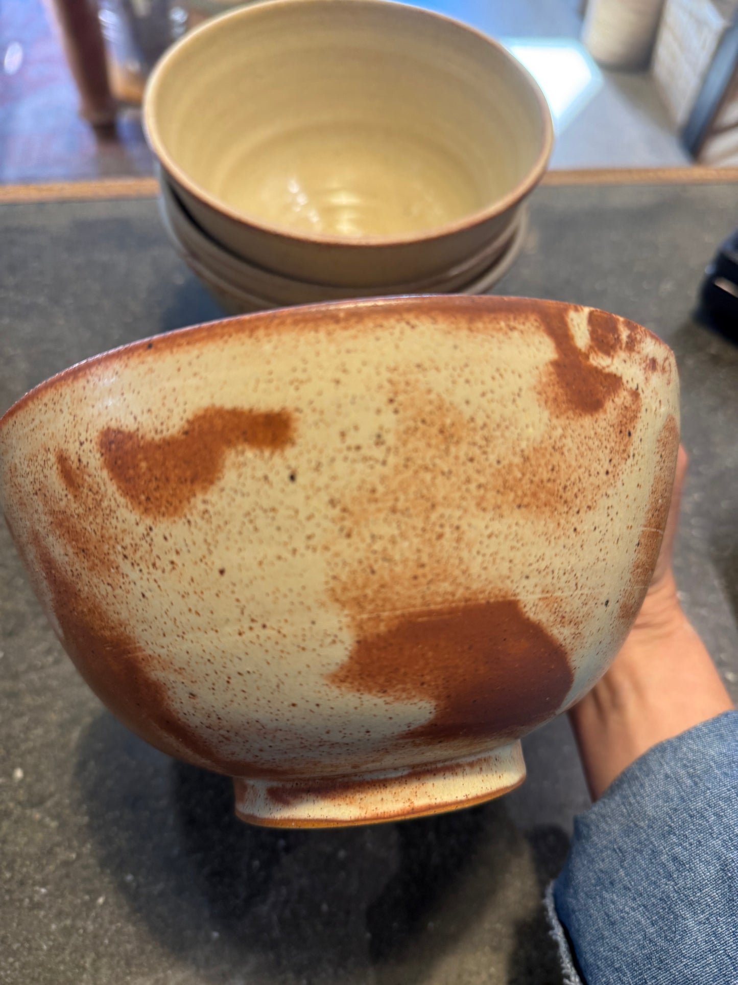 Speckled stoneware ramen bowl close-up showing beach glaze detail
