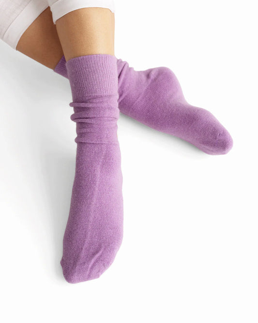 Possum merino wool socks in lilac breeze worn on feet