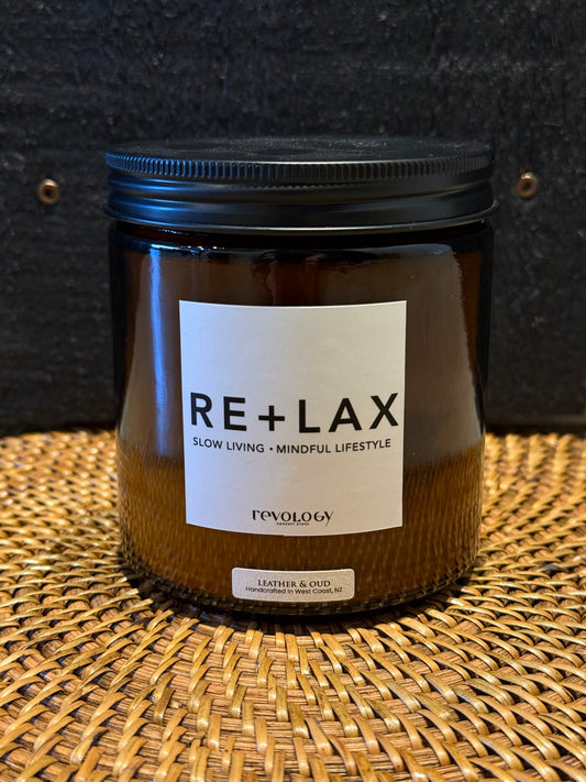 LEATHER AND OUD - Candle | REVOLOGY