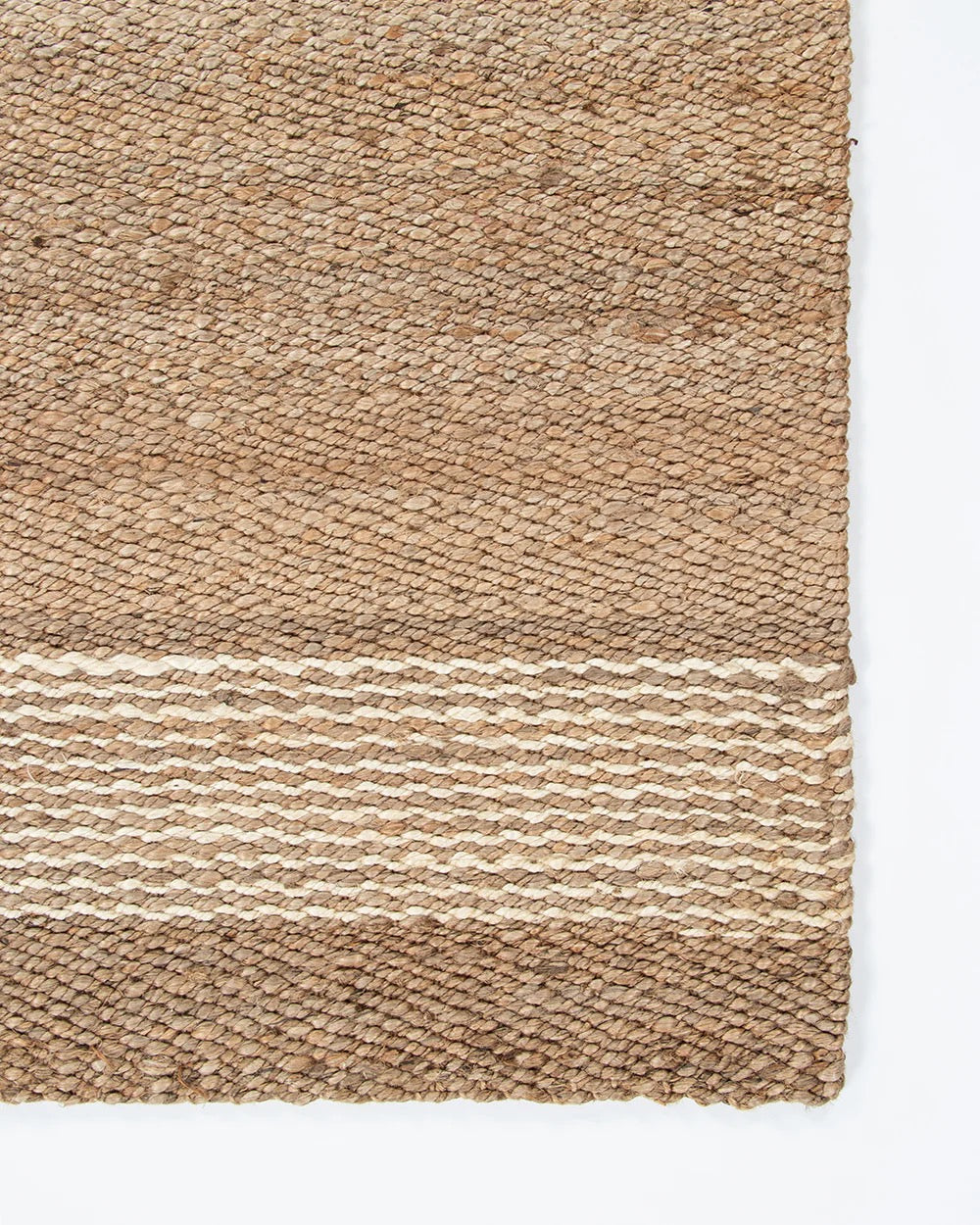 Close-up of natural jute door mat showing woven texture detail
